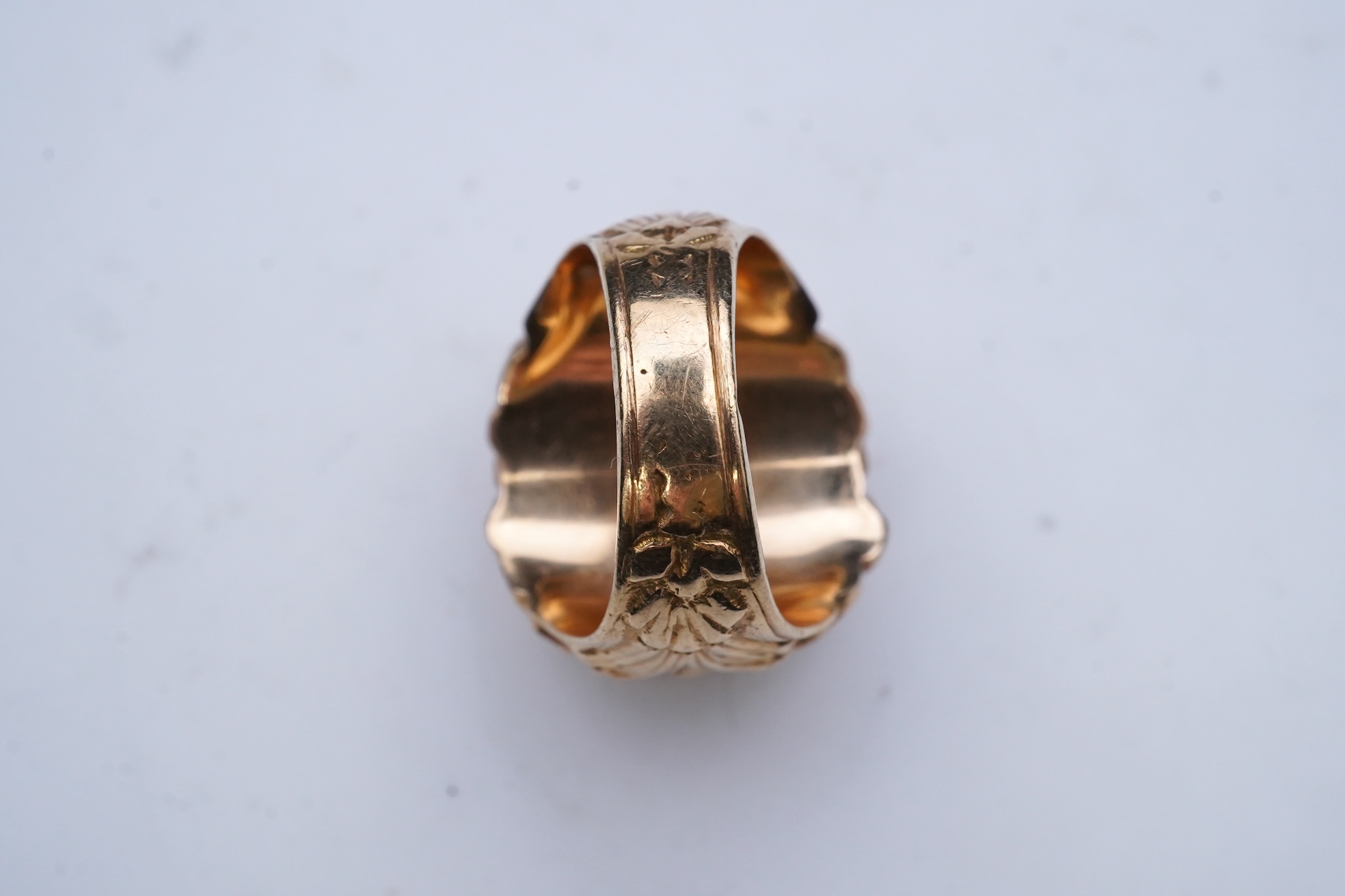 A gold peso coin ring